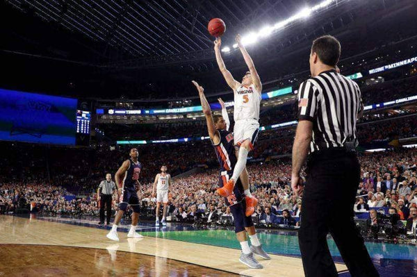 Virginia's Kyle Guy making a game winning shot over Auburn during NCAA March Madness 2019