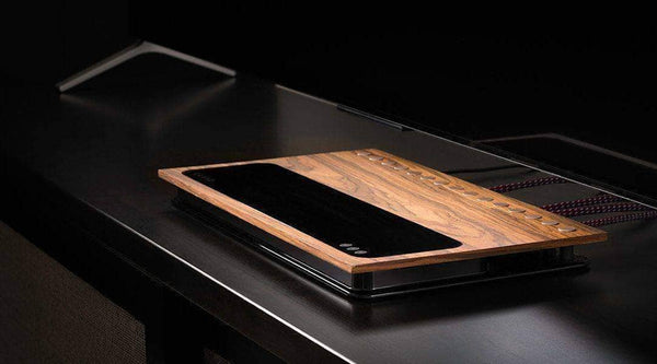 Side view of the limited-edition wood grained Caavo Control Center