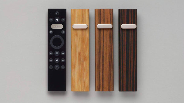 Caavo remote with 3 different woodgrain options